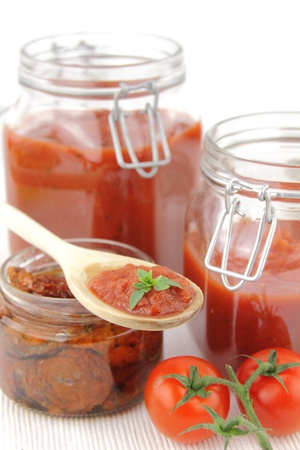 Tomato sauce and fresh tomatoesの写真素材