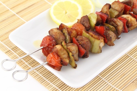 Grilled meat and vegetable skewerの写真素材