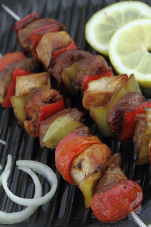 Grilled meat and vegetable skewerの写真素材