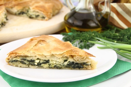 Homemade puff spinach pie with filo pastryの写真素材