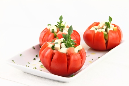 Caprese salad with tomatoes, mozzarella and basilの写真素材