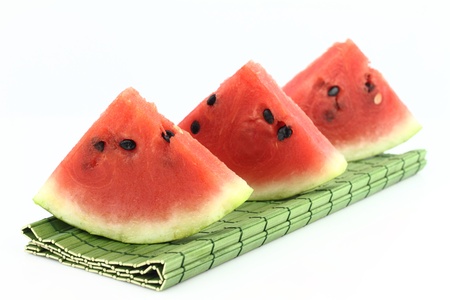 Watermelon slices on white backgroundの写真素材