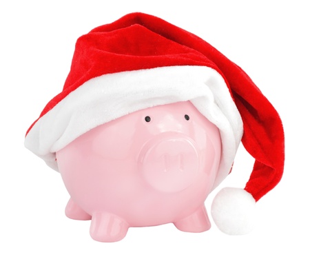 Piggy bank with Santa Claus hatの写真素材