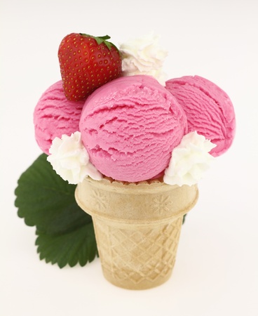 Strawberry ice cream cone on white backgraound の写真素材