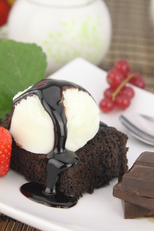 Brownie with ice cream on the dishの写真素材