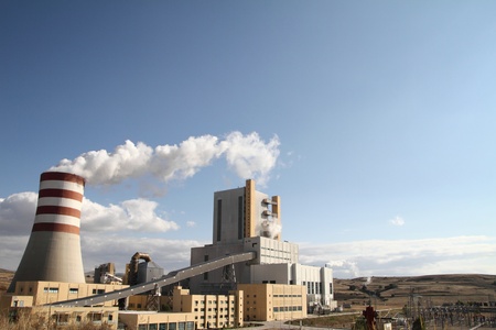 Power plant with smoking chimneyのeditorial素材