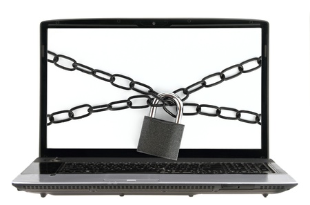 Computer bound with chain and padlockの写真素材