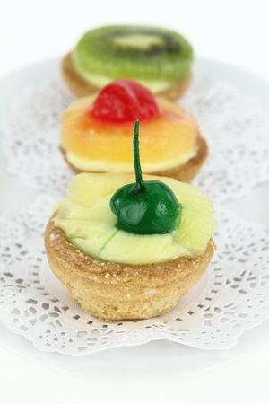 Creamy dessert tarts with fruitsの写真素材