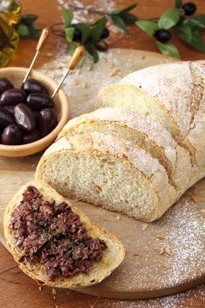 Fresh bread with olive tapenadeの写真素材