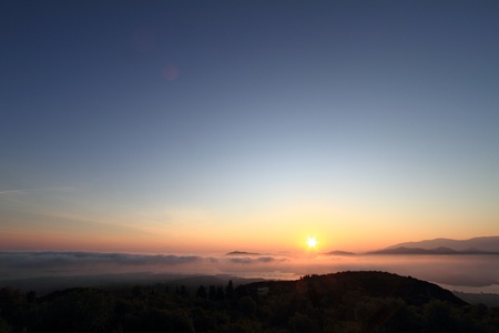 Scenic view of beautiful sunset over the mountainsの写真素材