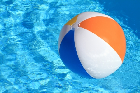 Summer background. Beach Ball on the swimming Poolの写真素材