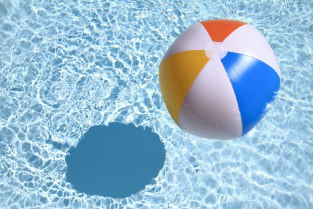 Summer background. Beach Ball on the swimming Poolの写真素材