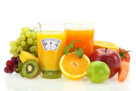 Diet and healthy eating. Fruits, vegetables and juice on whiteの写真素材