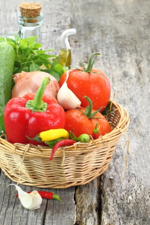 Fresh vegetables in wicker basketの写真素材