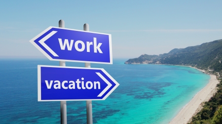 Work or vacation on road signs の写真素材