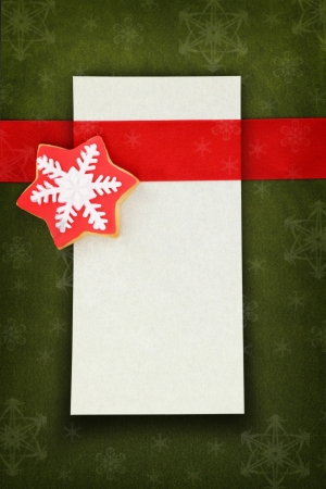 Christmas card with star cookie on fabric backgroundの写真素材