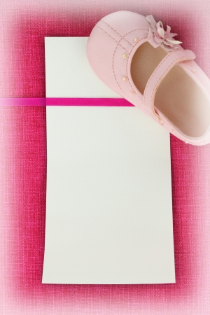 Empty card on pink fabric textureの写真素材