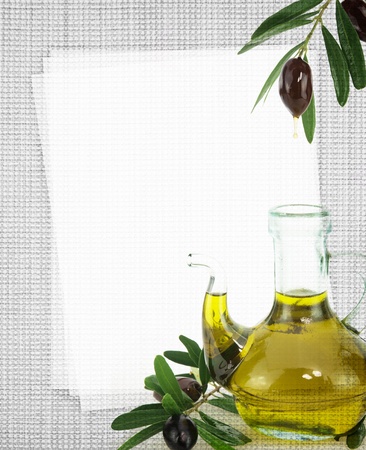 Recipe card. Bottle of olive oil on fabric textureの写真素材