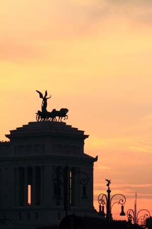 Rome at dusk, Goddess Victoria on Monument of Vittorio Emanuele の写真素材