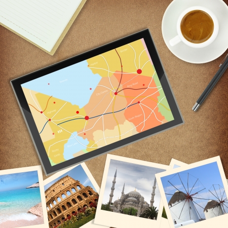 Tablet computer with gps map and photos of famous placesの写真素材