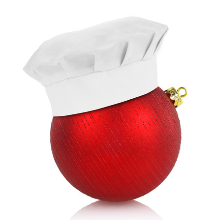 Chef hat on elegant Christmas ball isolated on whiteの写真素材