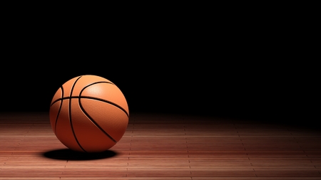 Basketball court floor with ball isolated on black and copy-space の写真素材