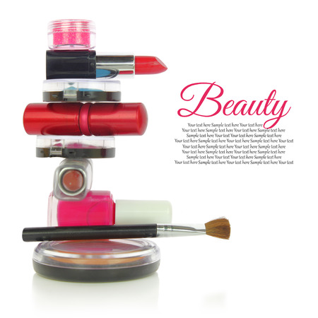 Various cosmetics in a row isolated on whiteの写真素材