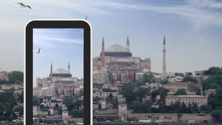 Tablet, smartphone taking picture of Hagia Sophia, Istanbul, Turkeyの写真素材