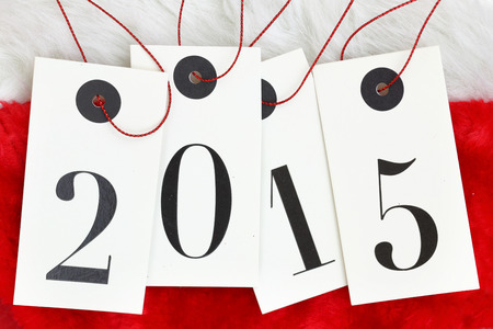 New year 2015 on tags on santas furの写真素材