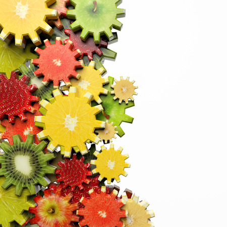 Gears made of fruit slices on white backgroundの写真素材