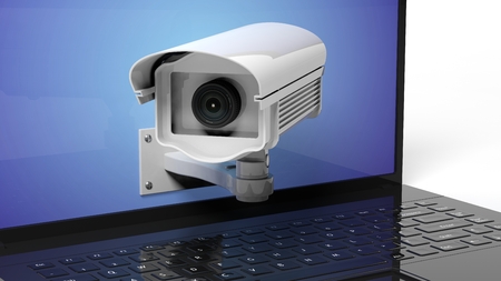 Security surveillance camera on laptop screen closeup
