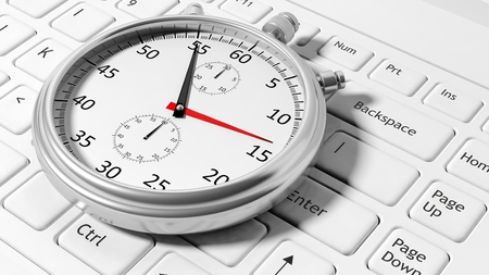 Silver chronometer white laptop keyboardの写真素材