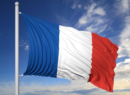 Waving flag of France on flagpole, on blue sky background.