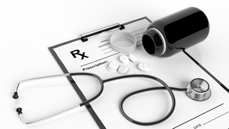 Blank prescription form with bottle of pills and stethoscope, isolated on white.の写真素材