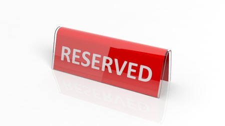 Red glossy reservation sign, isolated on white background.の写真素材
