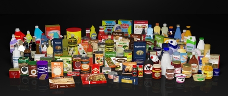 Various grocery products, on black background with reflections.の写真素材