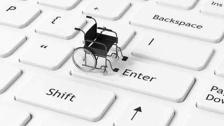 Computer keyboard closeup with wheelchair on enter keyの写真素材