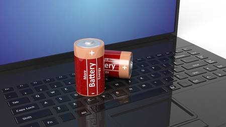 3D rendering of batteries on laptop's keyboardの写真素材
