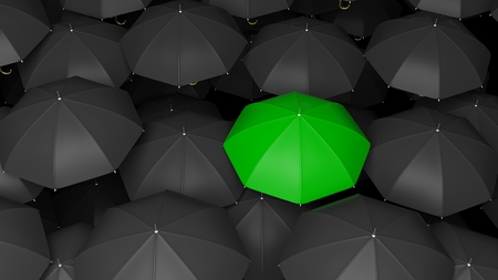3D rendering of classic large black umbrellas tops with one green standing out.の写真素材