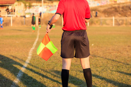 Football assistant referee during a gameの写真素材