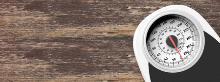 Bathroom scale on the right side of a wooden floor background. Copyspace for text. 3d illustrationの写真素材