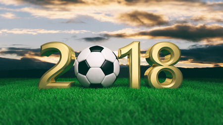 New year 2018 with soccer football ball on green grass, blue sky background. 3d illustrationの写真素材