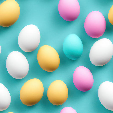 Seamless pattern with colorful easter eggs on pastel blue backgroundの素材