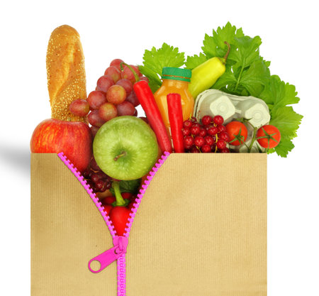 Healthy eating. Groceries in a paper bag with zipper isolated on white transparent background,の写真素材