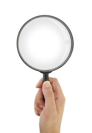 Female hand holding magnifying glass isolated on white transparent background, top viewの写真素材