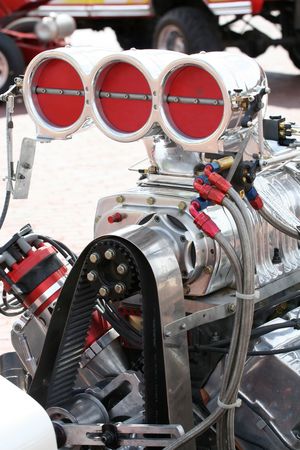 A large supercharged engine in a tractor used in tractor pulls.の写真素材
