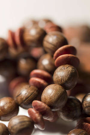 Necklace made of different types of wood の写真素材