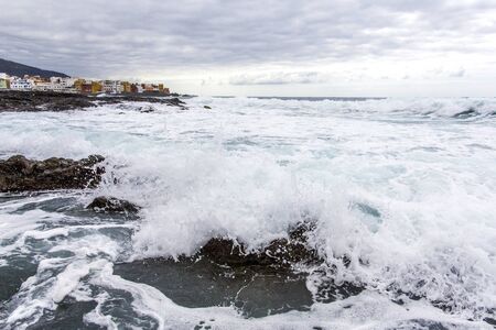 Puerto de la Cruz. black sand of playa Jardin,Puerto de la Cruz, Tenerife, Spain. Summer travel,...