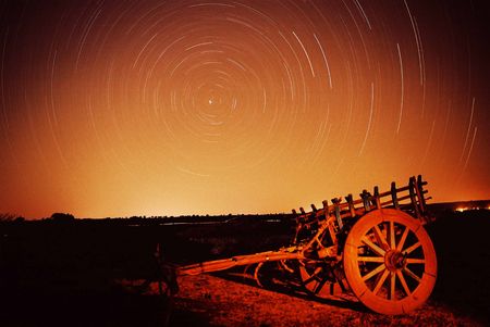 In this photograph the bull-cart is brushed by ambient light for limited time. Total exposure was approximately 2 hours.の写真素材