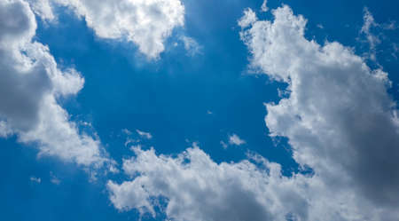 blue sky background with tiny clouds